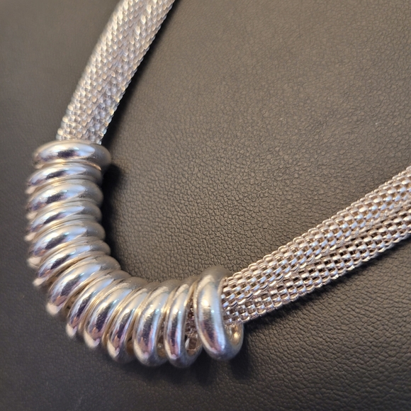 Serpentine bi-strand silver-tone necklace w/ silver-tone ring pendants - Picture 3 of 10